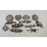 A COLLECTION OF VICTORIAN SILVER SWEETHEART BROOCHES, various designs, to include hallmarked and gem