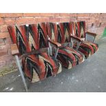 A BANK OF THREE VINTAGE CINEMA SEATS, cast metal framework, period fabric upholstery, hinged seats