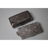 TWO SILVER VESTA CASES, the first being of snuff box form with scrolling foliate decoration and