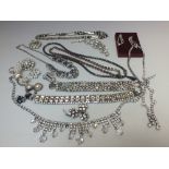 A COLLECTION OF VINTAGE DIAMANTE COSTUME JEWELLERY, to include two bracelets - one having damages, a