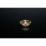 A HALLMARKED 18 CARAT GOLD RUBY AND DIAMOND RING - CHESTER 1918, approx weight 2.2g, ring size O