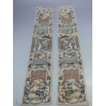 TWO ORIENTAL EMBROIDERED SILK PANELS, having typical floral and figural decoration, 48 x 8.7 cm (2)