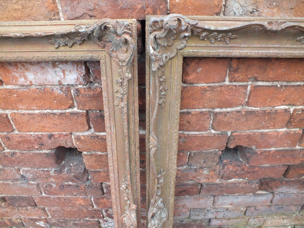 A NEAR PAIR OF ANTIQUE GILTWOOD PICTURE FRAMES, each with foliate moulded decoration and pierced - Image 2 of 2