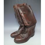 A PAIR OF VINTAGE LEATHER BOOTS, with lace and strap & buckle fastening, leather soles, approx