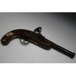 AN ANTIQUE CANON BARRELLED FLINTLOCK PISTOL, overall L 36 cm