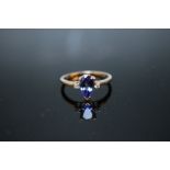 A HALLMARKED 9K GOLD AAA PEAR SHAPED TANZANITE RING, coming with certificate stating stone is 1.26