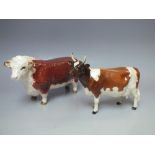 A BESWICK AYSHIRE COW CH. ICKHAM BESSIE, model 1350, together with a Beswick Hereford Bull (2)