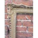 A 19TH CENTURY GILTWOOD AND PIERCED PICTURE FRAME, 91 X 58 cm A/FCondition Report:With losses -