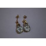 A PAIR OF HALLMARKED 9 CARAT GOLD SKY BLUE TOPAZ AND DIAMOND EARRINGS, coming with a certificate