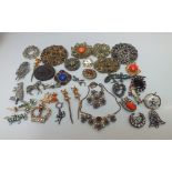 A COLLECTION OF VINTAGE FILIGREE COSTUME BROOCHES, largest Dia 6.1 cm, together with a further