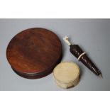 A GEORGIAN YEW WOOD CIRCULAR SNUFF BOX, Dia 10 cm, together with a smaller oval snuff box and a