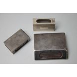 THREE HALLMARKED SILVER MATCHBOX HOLDERS TO INCLUDE AN UNUSUAL 'FLATTENED' EXAMPLE, various dates