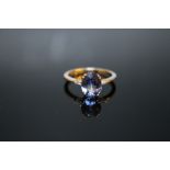 A HALLMARKED 14K GOLD AAA TANZANITE AND DIAMOND RING, coming with certificate stating stone is 2.6