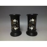 A PAIR OF DERBYSHIRE PIETRA DURA CYLINDRICAL VASES, each black slate classical vase with inlaid