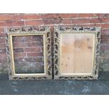 A PAIR OF GILT WOOD FLORENTINE STYLE PICTURE FRAMES, typical scrolling Florentine detail, rebate