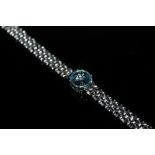 A SKY BLUE TOPAZ AND DIAMOND SILVER BRACELET, coming with a certificate that states the topaz is 5.