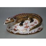 A ROYAL CROWN DERBY PAPERWEIGHT IN THE FORM OF A CROCODILE, printed marks to base, gold stopper, W