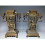 A PAIR OF EARLY 20TH CENTURY JAPANESE GILT METAL SQUARE SECTION CANDLE HOLDER VASES, pierced bodies,