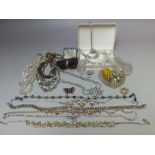 A COLLECTION OF VINTAGE COSTUME JEWELLERY, comprising a selection of bead and diamante necklaces,