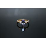 A HALLMARKED 14K GOLD MARQUISE AAA TANZANITE & DIAMOND RING, coming with certificate stating stone