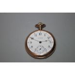AN ANTIQUE GOLD PLATED WALTHAM POCKET WATCH, the white dial with Arabic numerals, outer minute track