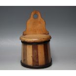 A LATE 19TH / EARLY 20TH CENTURY WOODEN SALT BOX, the two-tone body having banded decoration and
