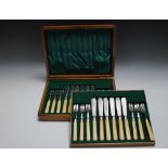 A CASED SET OF TWENTY FOUR HALLMARKED SILVER FISH KNIVES AND FORKS BY ISSAC ELLIS & SONS - SHEFFIELD