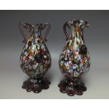 A MURANO MILLEFIORI TWIN HANDLED GLASS VASE, H 21.5 cm, together with a matched pitcher / jug (2)
