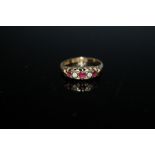 A HALLMARKED 18 CARAT GOLD RUBY AND DIAMOND RING - CHESTER 1916, approx weight 2.2g, ring size N