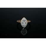 A MARQUISE SHAPED 18 CARAT GOLD DIAMOND RING, set with 0.77 carat of brilliant cut diamonds, ring