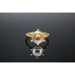 A HALLMARKED 9K GOLD SERENITE PADPARADSCHA COLOUR TOPAZ AND DIAMOND RING, coming with certificate