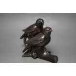 AN UNUSUAL SILVER PLATED CRUET IN THE FORM OF BIRDS ON A BRANCH, the branch having carry handle to