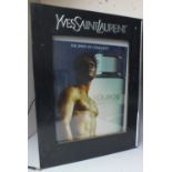 A VINTAGE YVES SAINT LAURENT ADVERTISING SIGN, for 'Kouros' aftershave, having fittings for