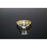 A HALLMARKED 9K GOLD TRILLIANT CUT SKY BLUE TOPAZ AND DIAMOND RING, coming with certificate that