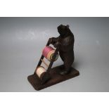 A VINTAGE BLACK FOREST BEAR NOVELTY COTTON REEL HOLDER, on rectangular wooden base, H 12.5 cm,