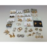 A COLLECTION OF VINTAGE COSTUME EARRINGS, mostly clip-ons, various styles to include examples by