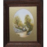 PETER GRAVES - A WATERCOLOUR OF SHEEP ON A PATHWAY, signed lower right, in oval mount, framed and