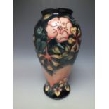 A MOORCROFT 'OBERON HONEYSUCKLE' PATTERN BALUSTER VASE, printed and painted marks to base