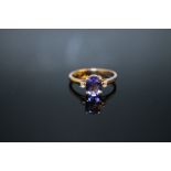 A HALLMARKED 18K GOLD AAA TANZANITE AND DIAMOND RING, coming with certificate stating stone is 1.