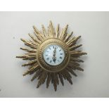 AN EARLY 20TH CENTURY GILT WOOD FRENCH SUNBURST WALL CLOCK, with a 'Japy Freres' stamped movement,