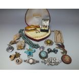 A COLLECTION OF VINTAGE COSTUME JEWELLERY, comprising a selection of brooches to include signed