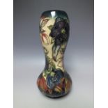A MOORCROFT 'HELLEBORE' PATTERN ONION SHAPE VASE, printed and painted marks to base, H 27.5 cm