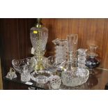 A QUANTITY OF ASSORTED CUT AND CRYSTAL GLASS TO INCLUDE LAMP, PERFUME BOTTLES, CANDLE STICKS, ETC