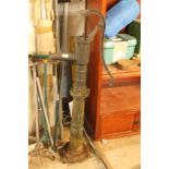 A VINTAGE CAST WATER PUMP