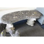 A STONE GARDEN BENCH WITH SQUIRREL PEDESTALS