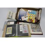 A LARGE QUANTITY OF ASSORTED STAMPS AND FIRST DAY COVERS, ETC