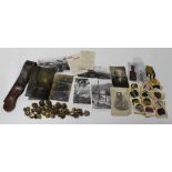 A TRAY OF MILITARY BADGES, BUTTONS, ETC