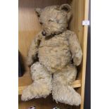 AN ANTIQUE TEDDY BEAR