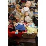 A LARGE QUANTITY OF ASSORTED DOLLS, TO INCLUDE TINY TEARS DUMMY (BEHIND CABINET), ETC