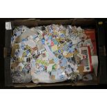 A LARGE QUANTITY OF ASSORTED STAMPS